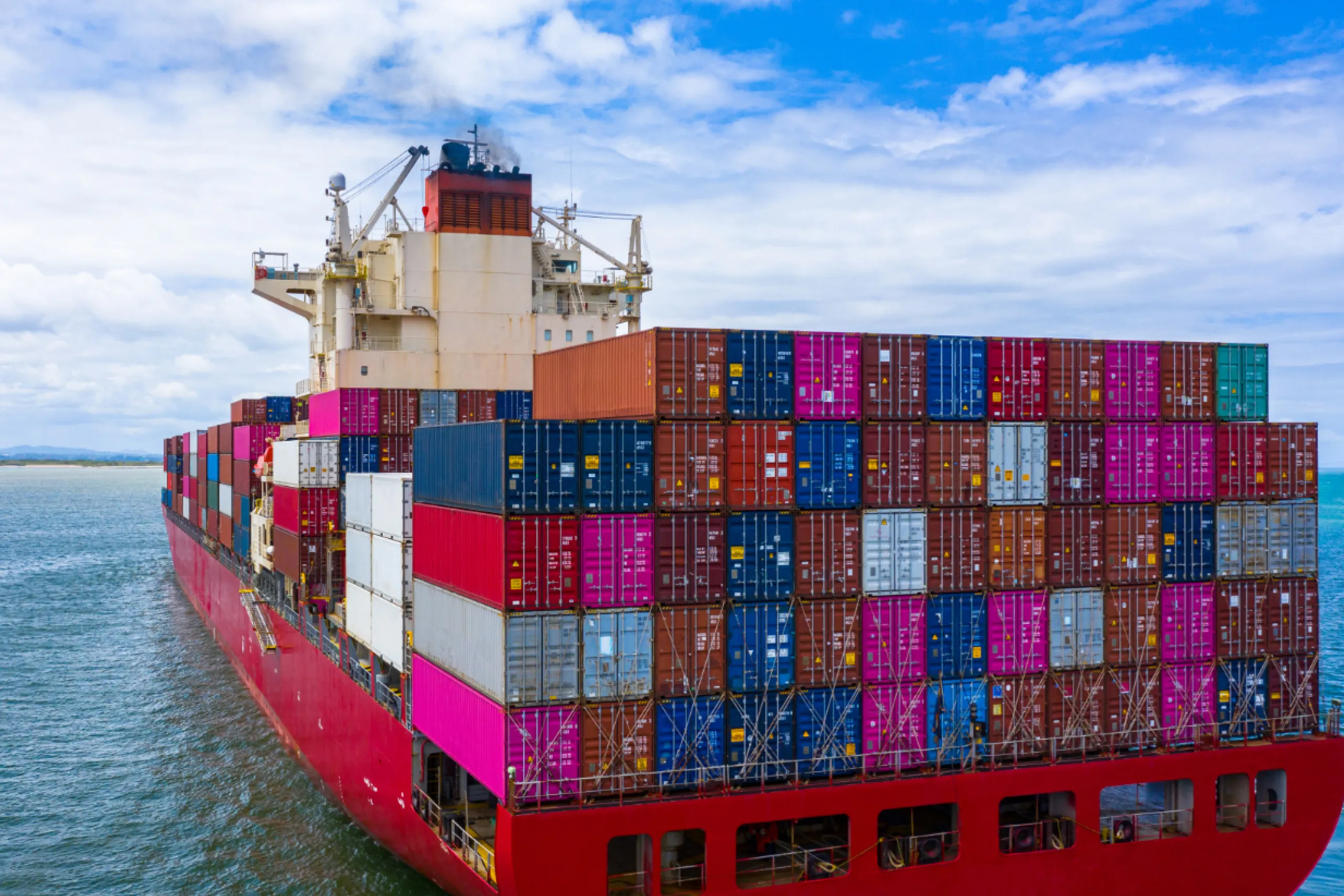 International shipping container vessel supporting relocation services in Saudi Arabia and UAE