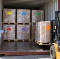 freight-consolidator-shared-lcl-container Forklift loading palletised cargo from different shippers into one shared LCL container